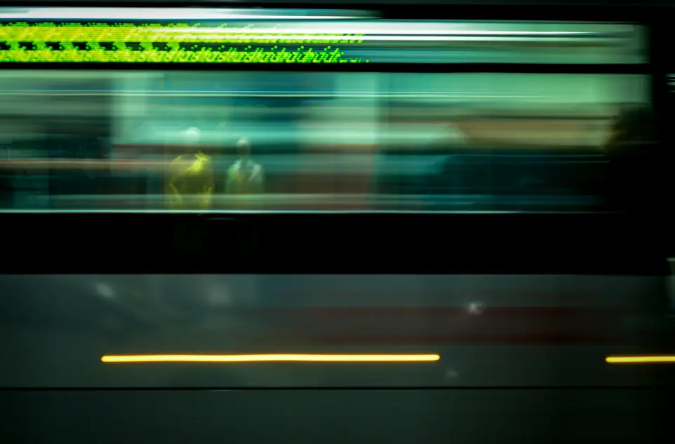 a blurry photo of a subway train